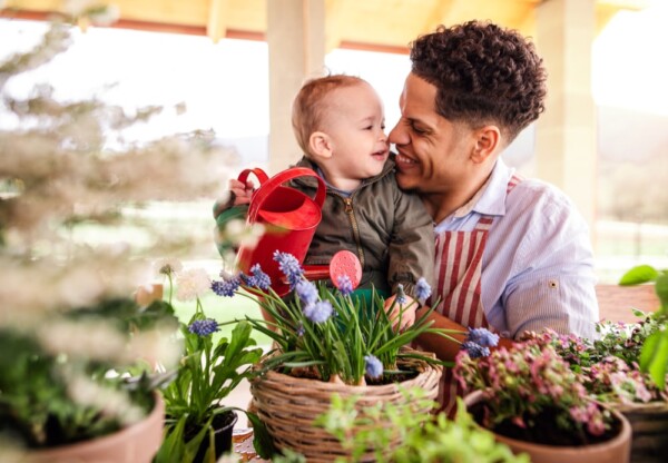 A father and son working with plants